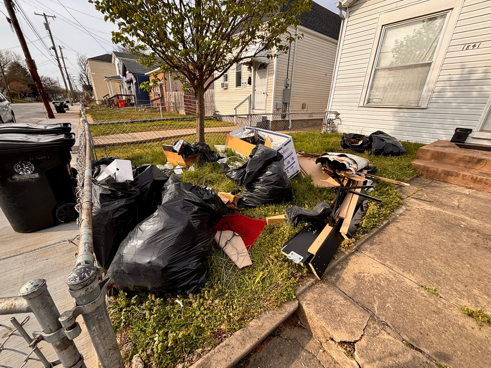 Before: curbside junk pile scheduled for removal